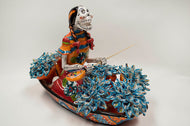 Vendedora de flores en canoa